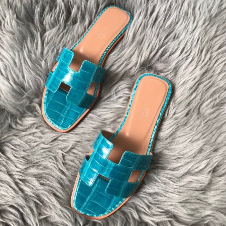 Hermes Oran Slide Sandals In Blue Paon Shiny Niloticus Crocodile Skin