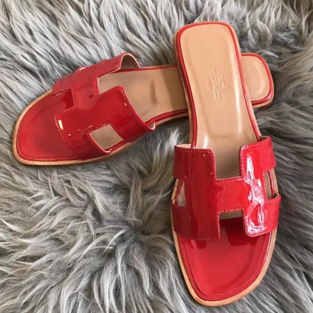 Hermes Oran Slide Sandals In Red Patent Calfskin