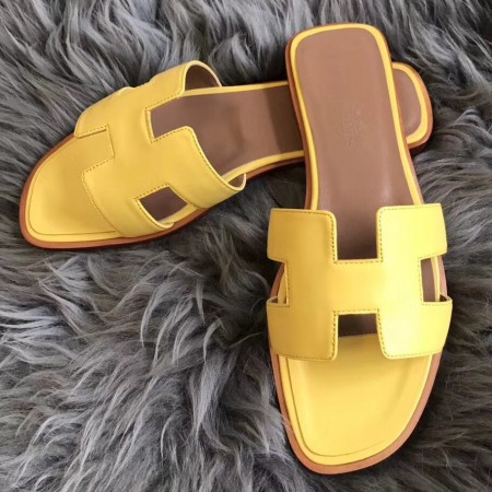 Hermes Oran Slide Sandals In Yellow Swift Calfskin