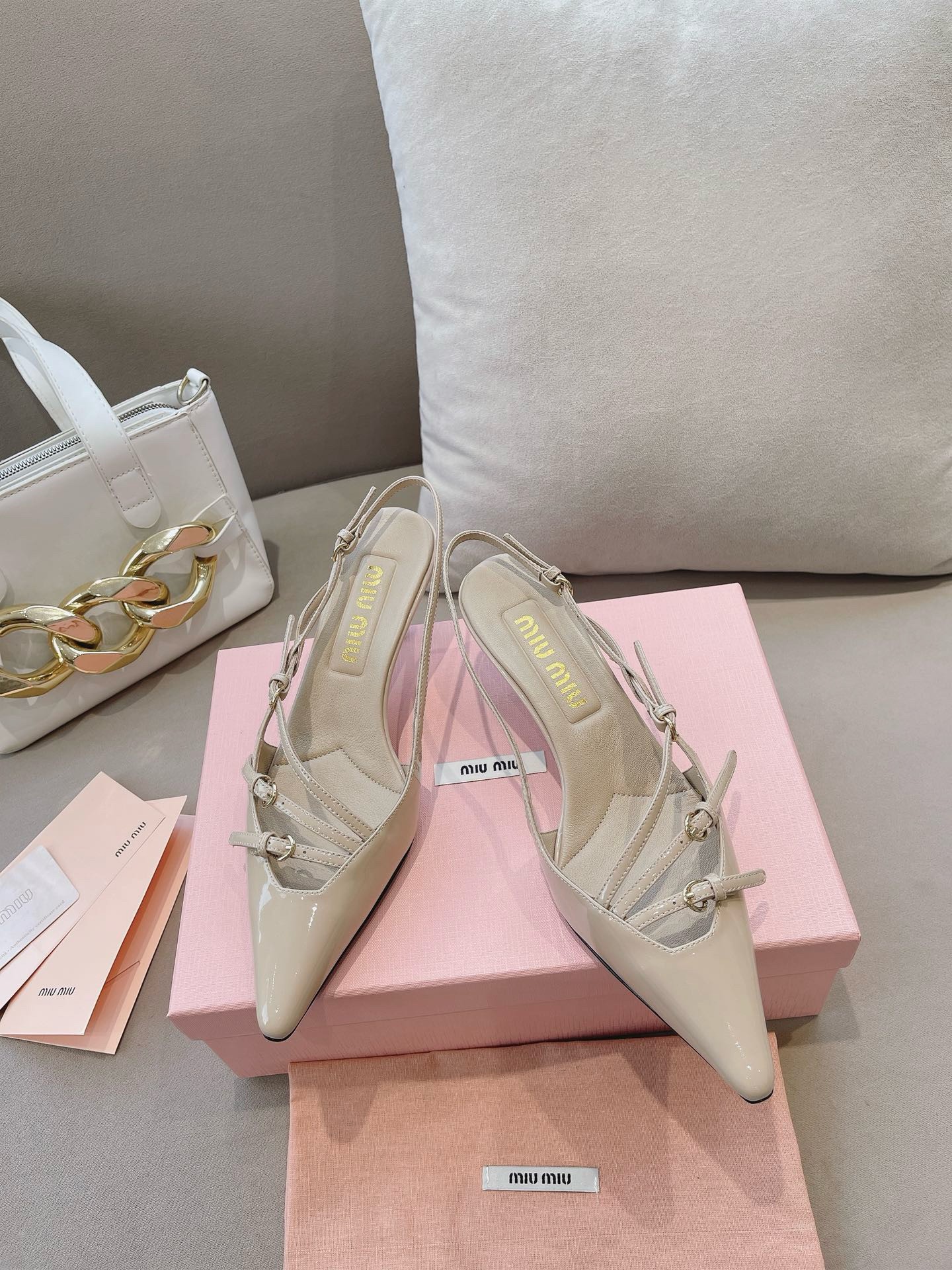 miu miu patent leather slingback pumps