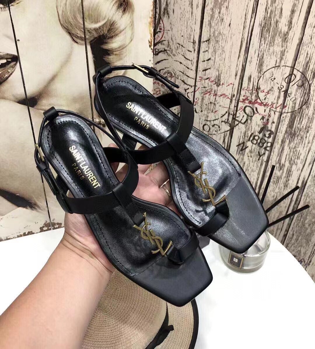 Replica Saint Laurent Cassandra Flat Sandals In Black Calfskin