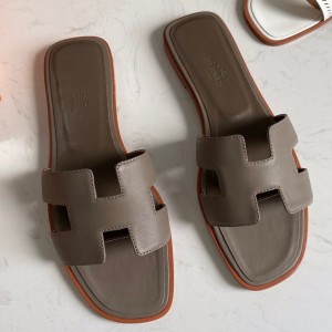 Hermes Oran Slide Sandals In Taupe Swift Calfskin