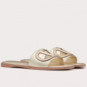 Valentino VLogo Cut-out Slide Sandals in Gold Metallic Leather