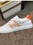 Hermes Men's Avantage Sneakers In White/Orange Calfskin