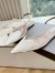 Alaia Le Coeur Slingback Flats in White Patent Calfskin