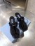 Prada Heeled Thong Sandals In Black Brushed Leather