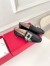 Roger Vivier Mini Broche Buckle Loafers in Black Patent Leather