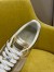 Valentino Women's Upvillage Sneaker in Gold Laminated Leather 