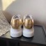 Alexander McQueen Women's Oversized Sneakers With Gold Heel