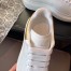 Alexander McQueen Women's Oversized Sneakers With Gold Heel