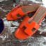 Hermes Oran Slide Sandals In Orange Patent Calfskin