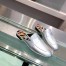 Hermes Catena Mules In Silver Metallic Calfskin