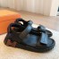Hermes Women's Junior Sandals in Black Nappa Leather
