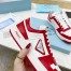 Prada Downtown Sneakers in White and Red Calfskin
