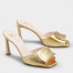 Roger Vivier Trompette Metal Buckle Mules in Gold Metallic Leather